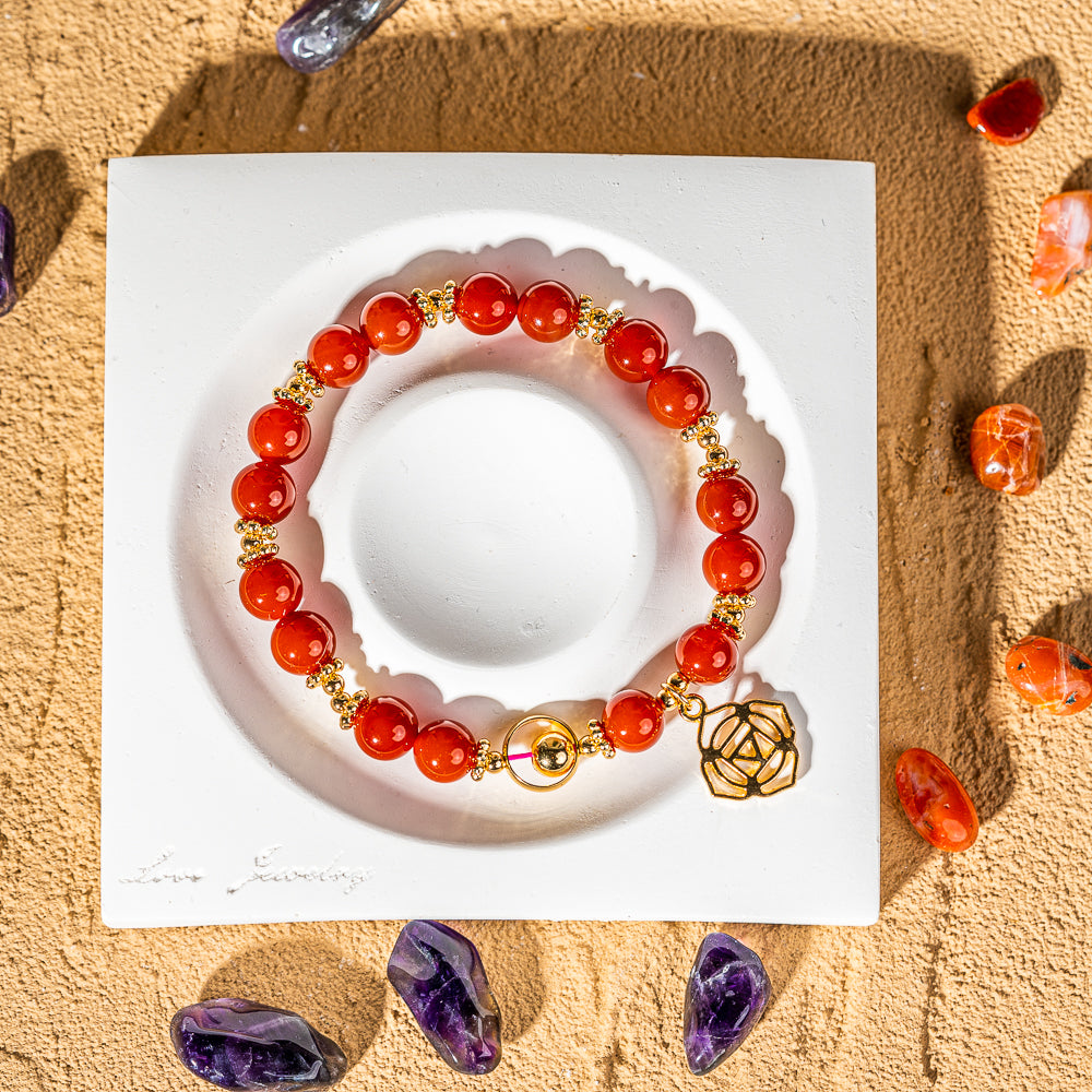 Crystelling Carnelian Bracelet with Root Chakra Sign