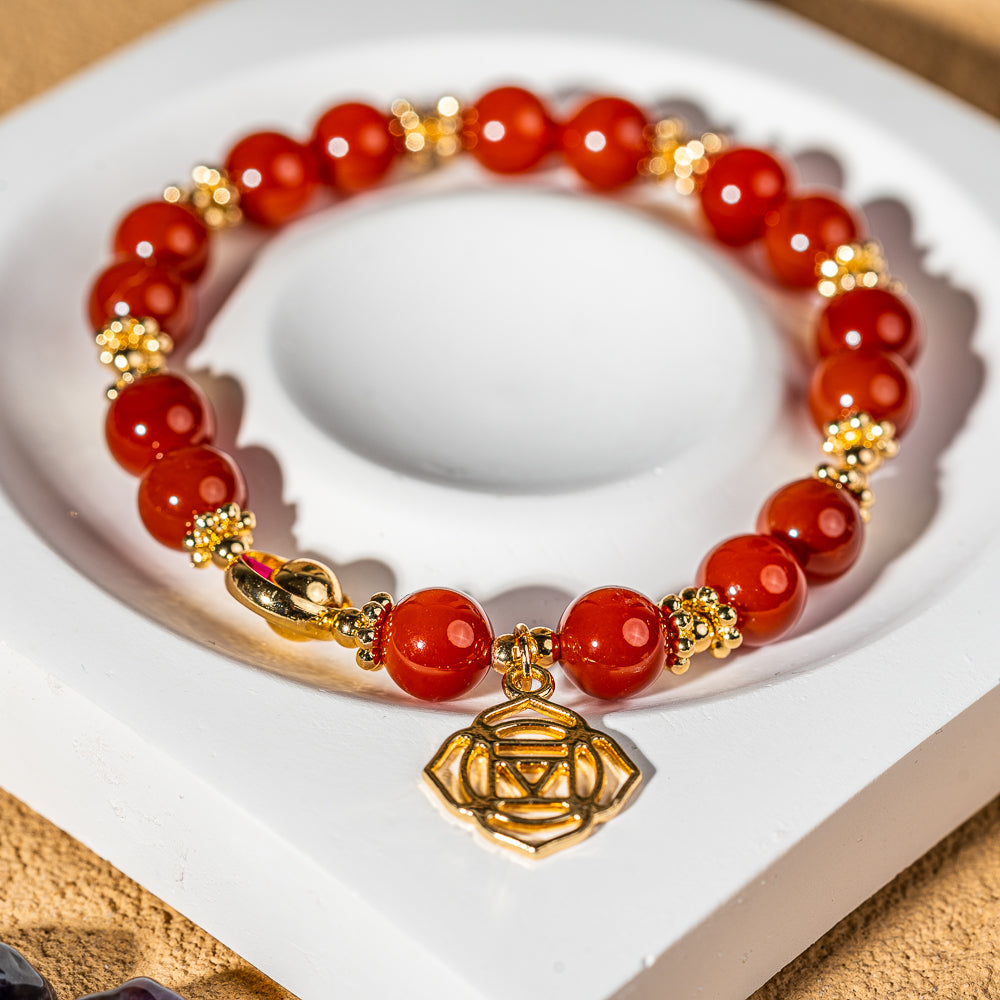 Crystelling Carnelian Bracelet with Root Chakra Sign