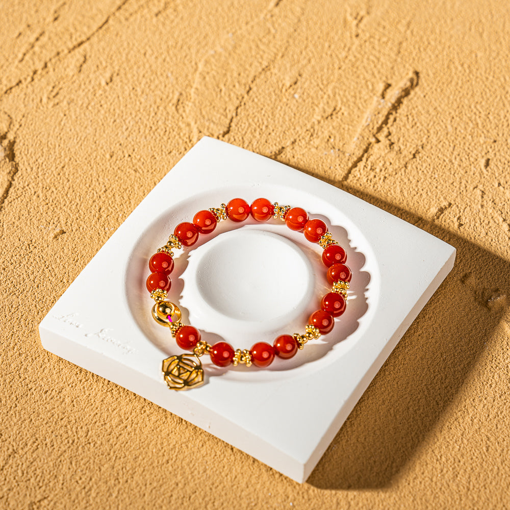 Crystelling Carnelian Bracelet with Root Chakra Sign