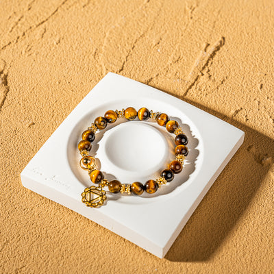 Crystelling Yellow Tiger Eye Bracelet with Sacral Chakra Sign