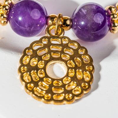 Crystelling Amethyst Bracelet with Golden Crown Chakra Sign