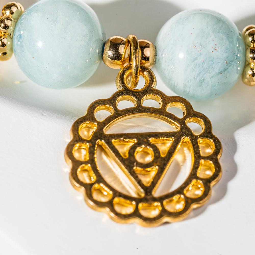 Crystelling Aquamarine Bracelet with Golden Throat Chakra Sign