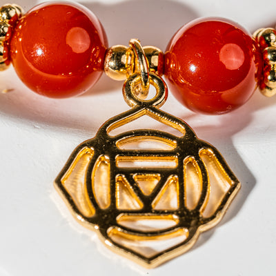 Crystelling Carnelian Bracelet with Root Chakra Sign