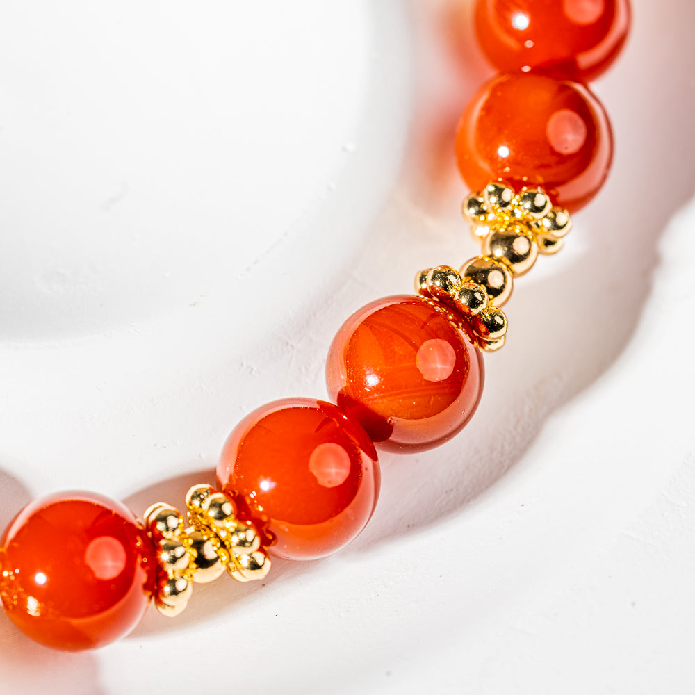 Crystelling Carnelian Bracelet with Root Chakra Sign