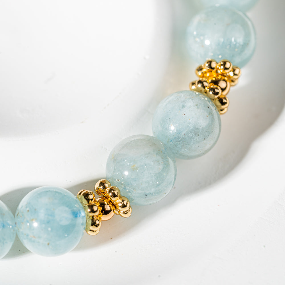 Crystelling Aquamarine Bracelet with Golden Throat Chakra Sign