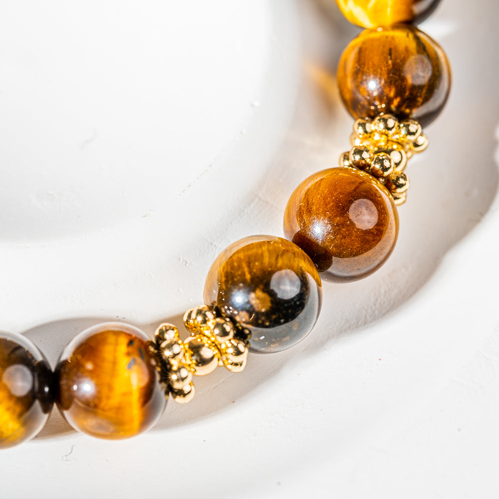 Crystelling Yellow Tiger Eye Bracelet with Sacral Chakra Sign